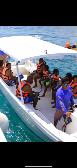 Group boat excursion on turquoise water